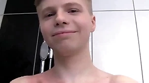 Cute butyraceous boy solo in a shower
